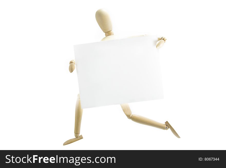 Running wooden mannequin holding blank note on white background