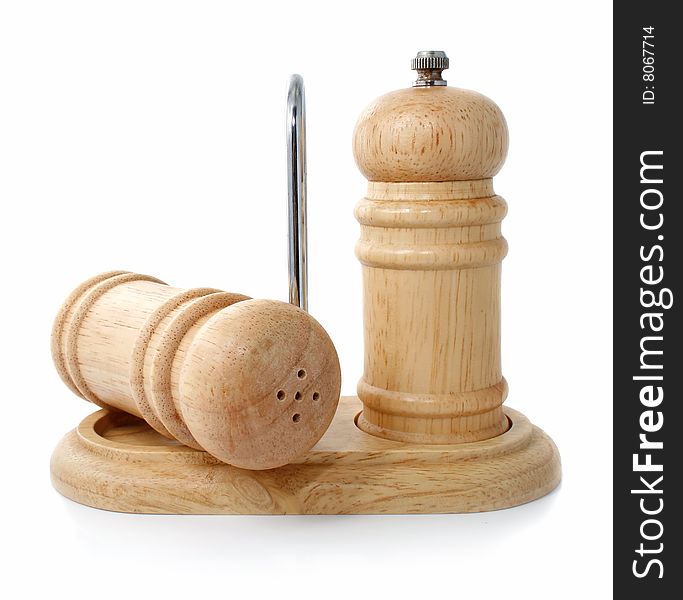 Wooden salt sellar and pepper caster isolated on the white background