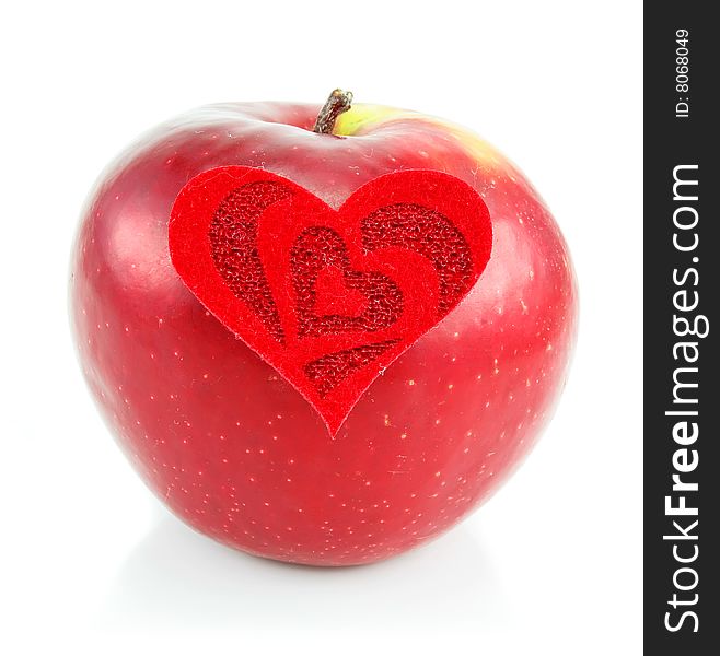 Red apple and red heart made of cloth isolated on a white background