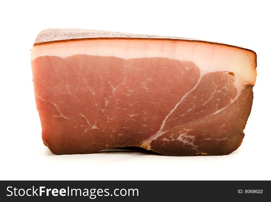 Piece of a ham on a white background. Isolated. Piece of a ham on a white background. Isolated