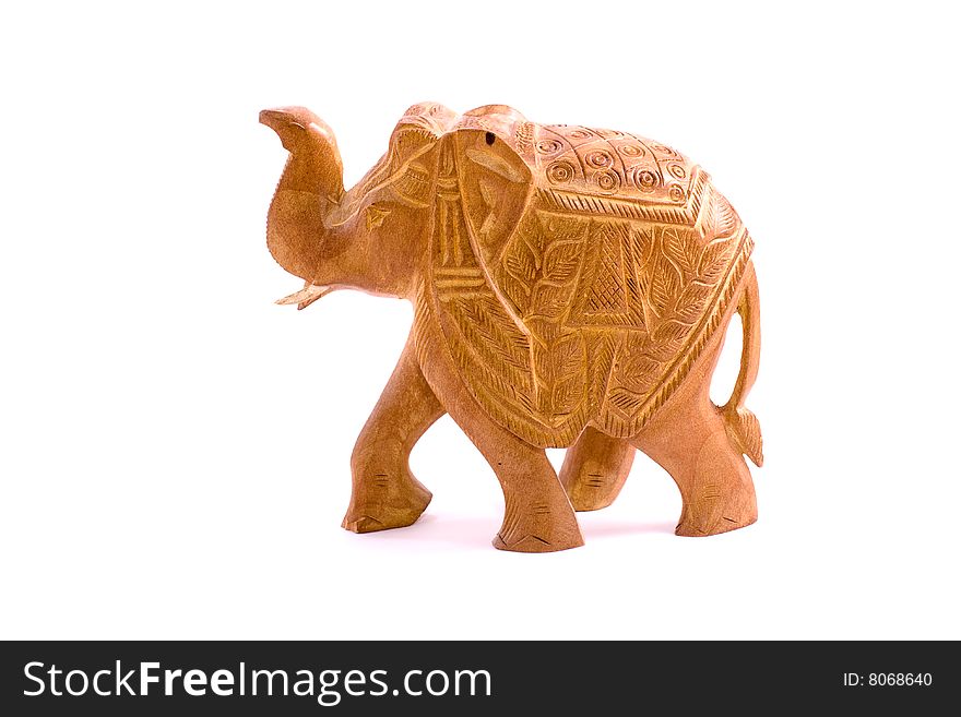 Wooden elephant sculpture isolated on white