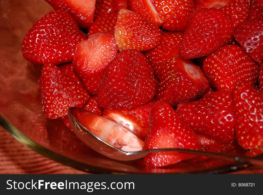 This is a bowl of fresh plump red strawberries.