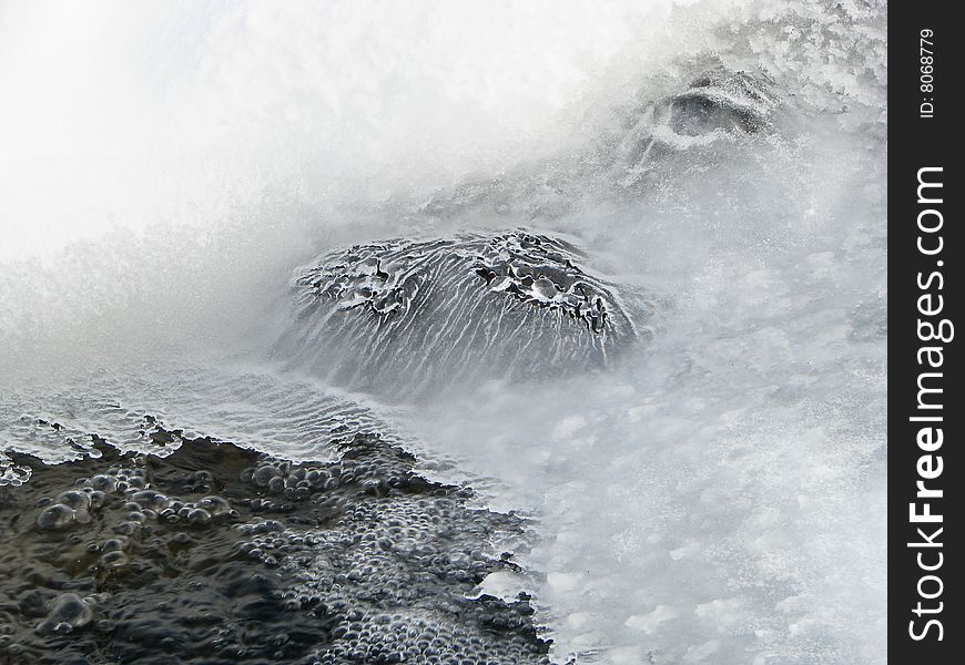 The frost make ice pattern on the water. The frost make ice pattern on the water