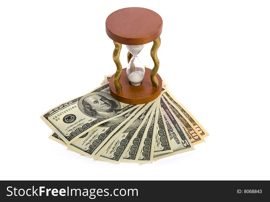 Dollars and hourglass on white background. Dollars and hourglass on white background