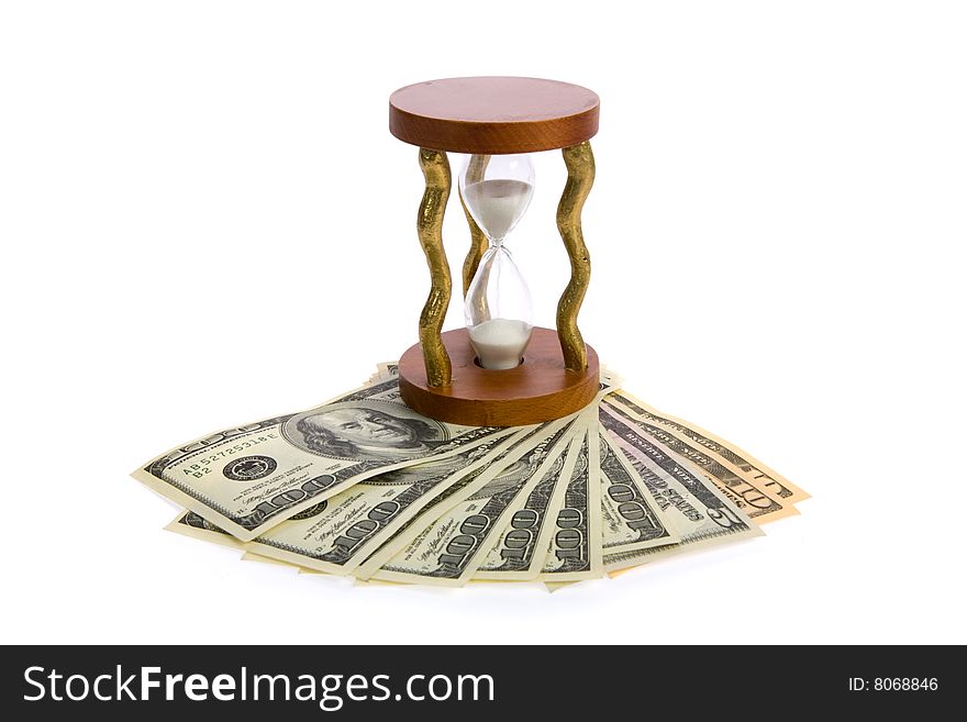 Dollars and hourglass on white background. Dollars and hourglass on white background