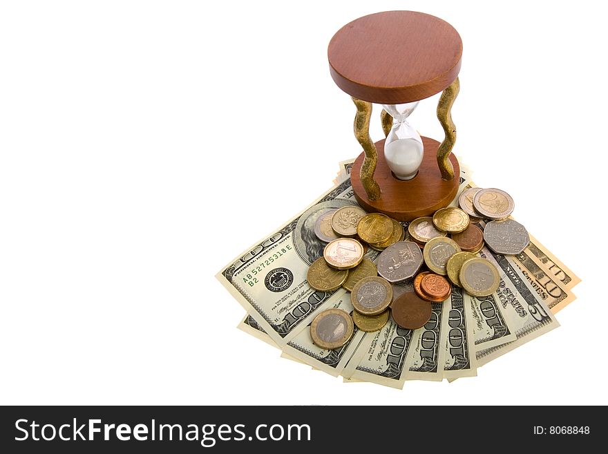 Dollars and hourglass on white background. Dollars and hourglass on white background