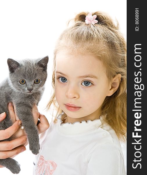 Young girl with kitten. Isolated on white background