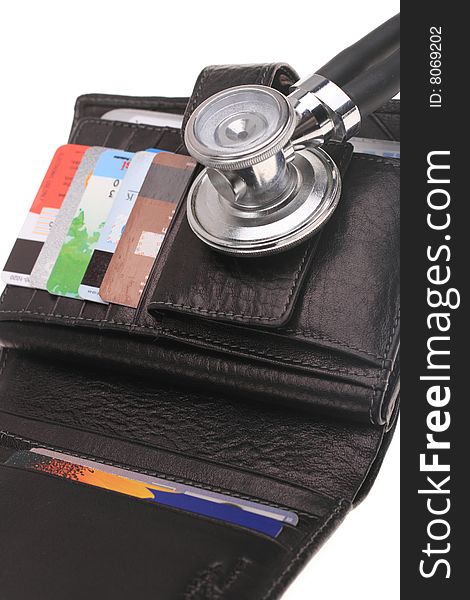Stethoscope, credit card and purse. Stethoscope, credit card and purse