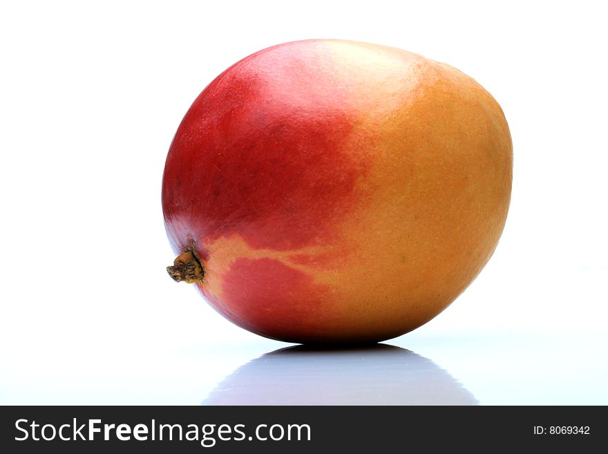 One mango on white background
