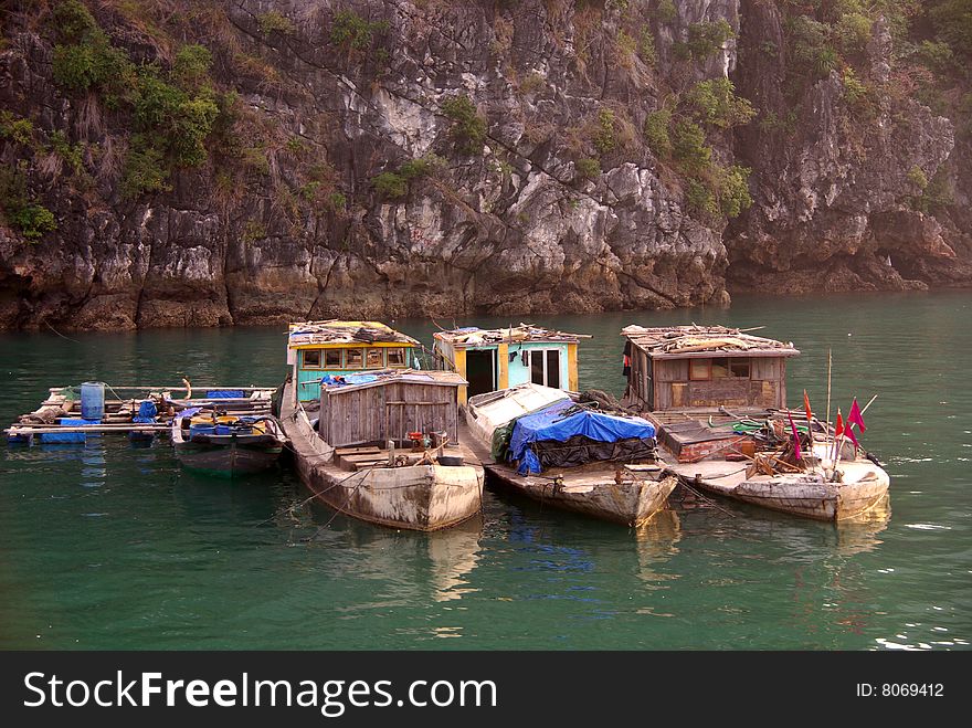 Fishing vessels in Ha Long bay in Vietnam. Fishing vessels in Ha Long bay in Vietnam