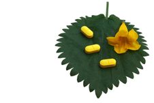 Yellow Tablets And Flower Royalty Free Stock Photos Yellow Tablets And Flower Royalty Free Stock Photos
