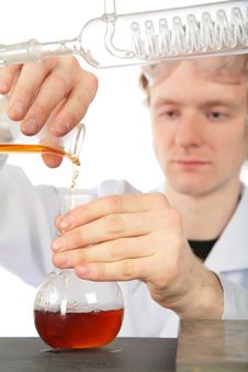 Chemist Pours Brown Liquid In Flask Royalty Free Stock Photos Chemist Pours Brown Liquid In Flask Royalty Free Stock Photos