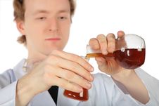 Chemist Pours Liquid From Flask In Another Royalty Free Stock Photo Chemist Pours Liquid From Flask In Another Royalty Free Stock Photo