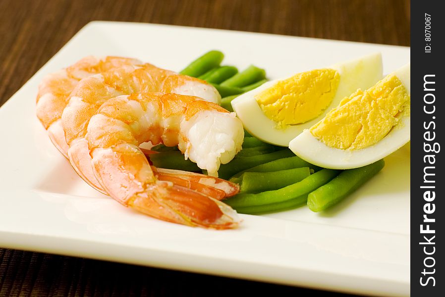 Delicious salad of shrimps with eggs and green beans