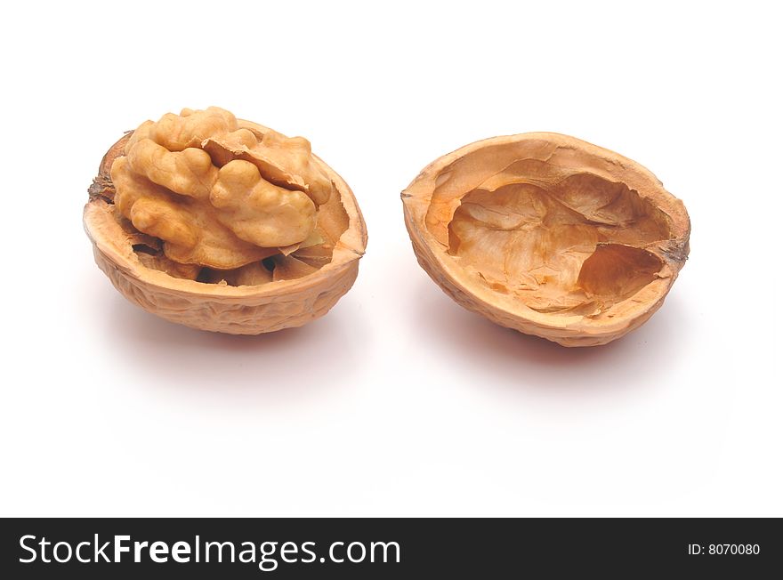 The split walnut which is represented on a white background