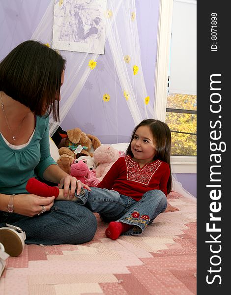 Mother Removing Her Daughter S Sock Free Stock Images And Photos