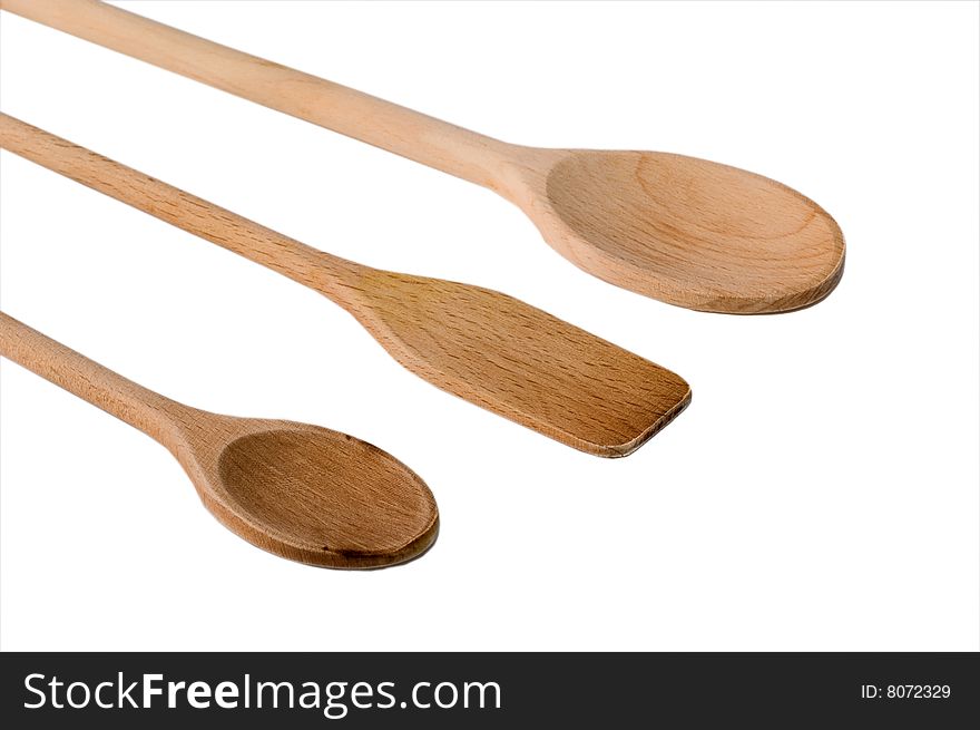 Three wooden spoons isolated on white