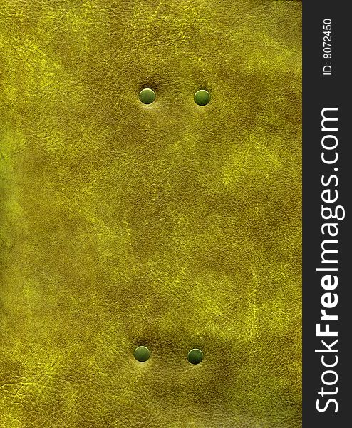 Close-up gold leather texture with rivet to background