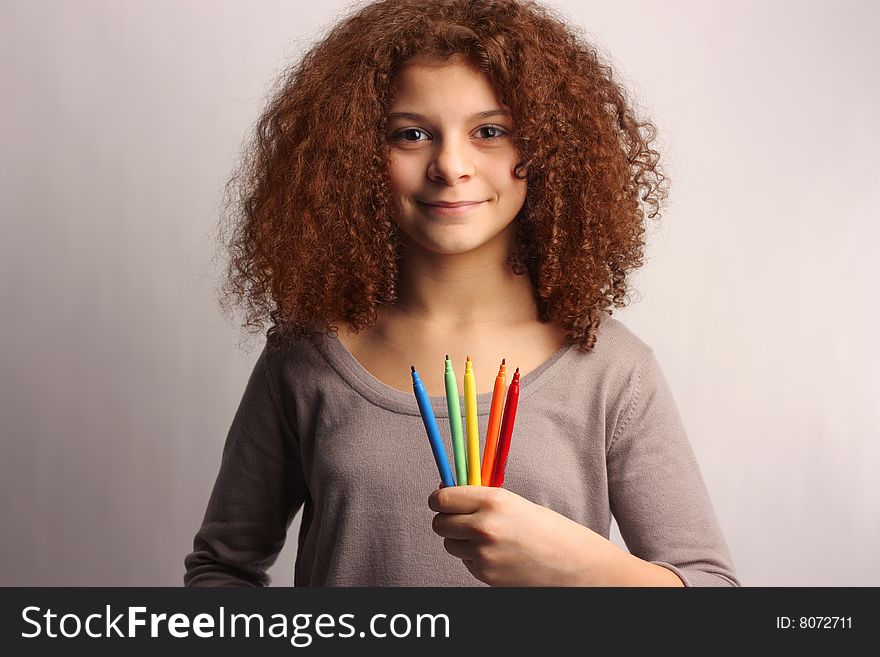 A female teen with felt pen. A female teen with felt pen