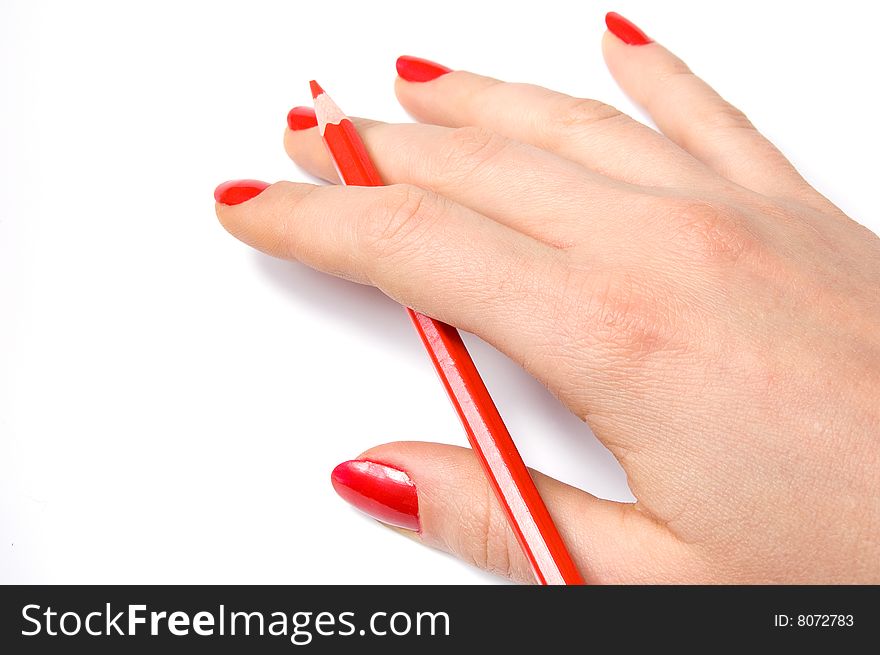 Red pencil in woman hand, isolated on white