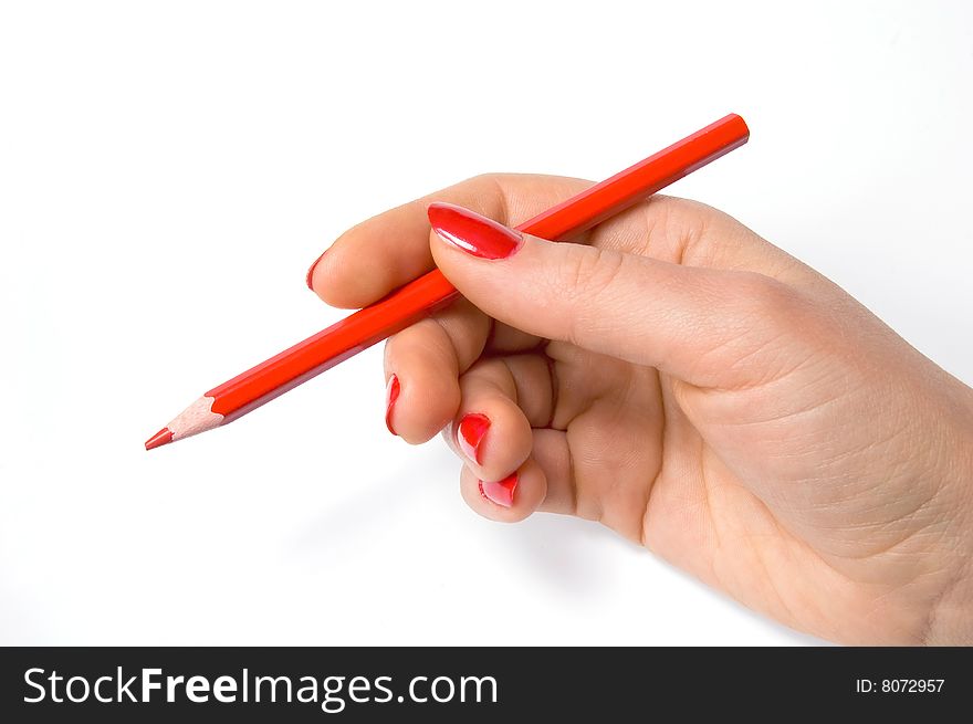 Red pencil in woman hand, isolated on white