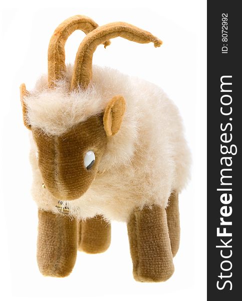 Little goat toy on white background