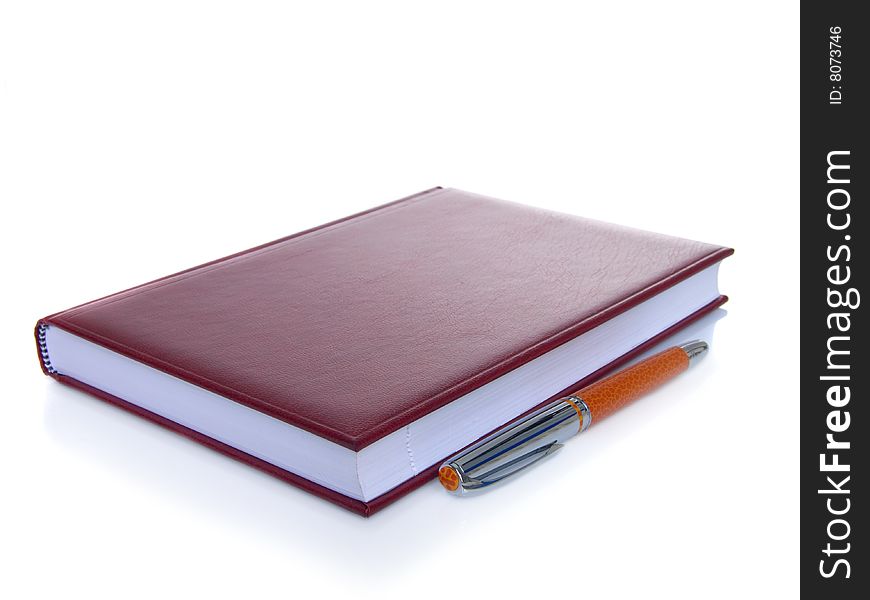 Notebook and pen isolated on a white background