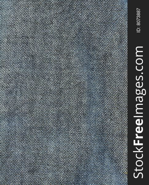 Close-up grey jean textile texture to background