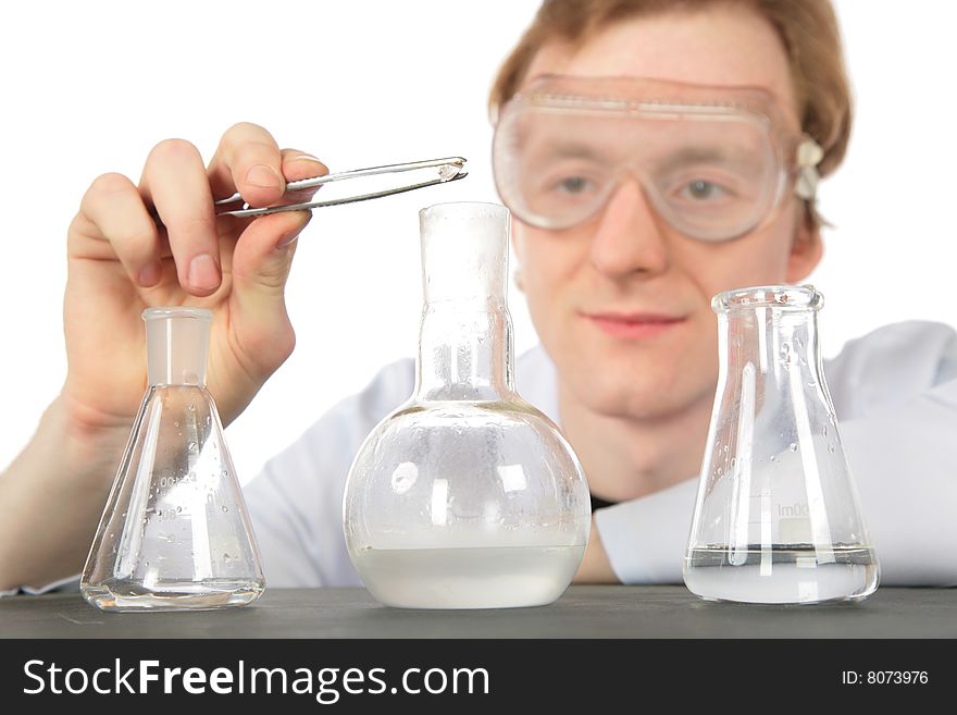 Chemist and three flasks