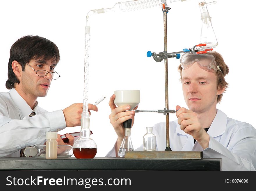 Two Chemists With Chemical Equipment