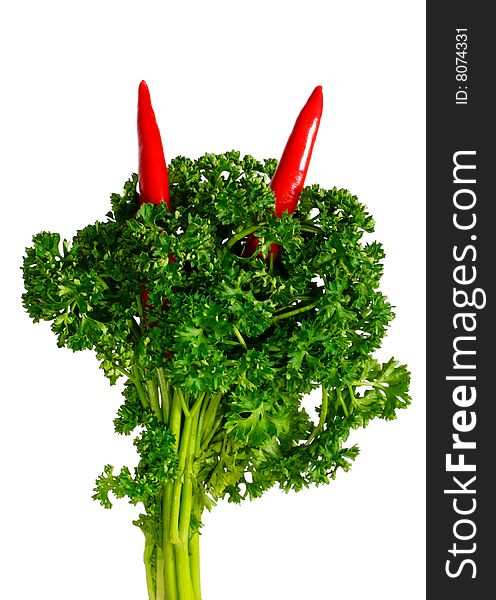 Curly parsley with red hot peppers isolated on white