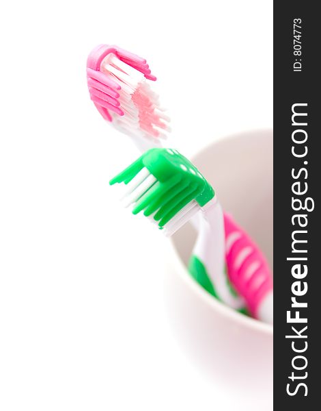 Two toothbrushes on white background