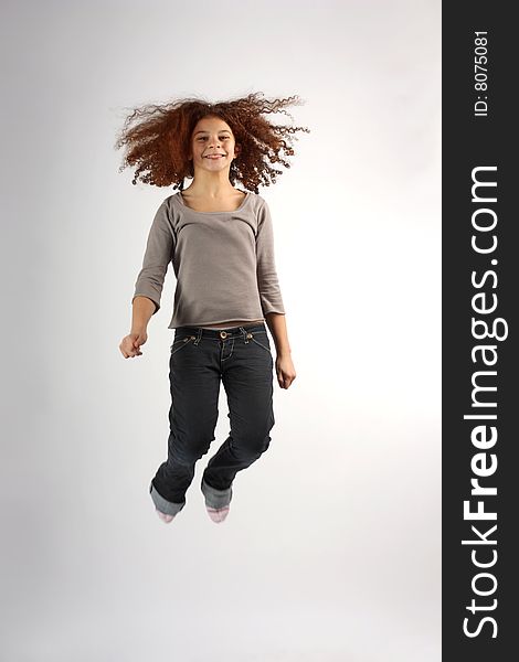 Portrait of a young teen jumping
