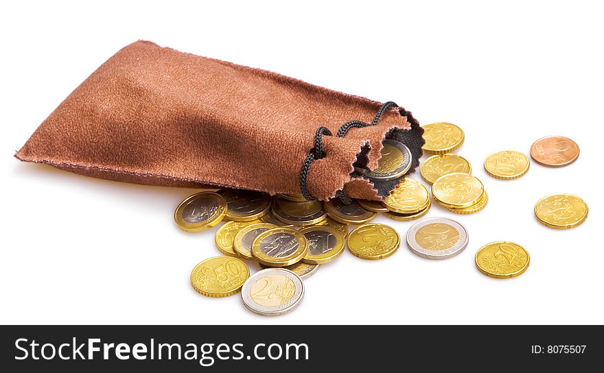 Euro coins and small bag isolated on white. Euro coins and small bag isolated on white.