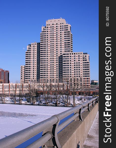 A skyscraper along the banks of the Grand River, Grand Rapids, MI. A skyscraper along the banks of the Grand River, Grand Rapids, MI