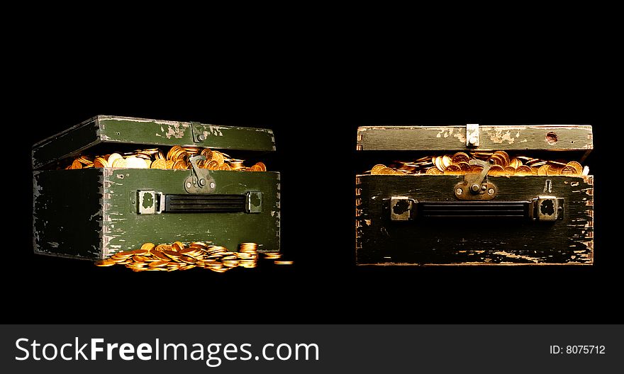 Chest full of gold isolated on black background. Chest full of gold isolated on black background.