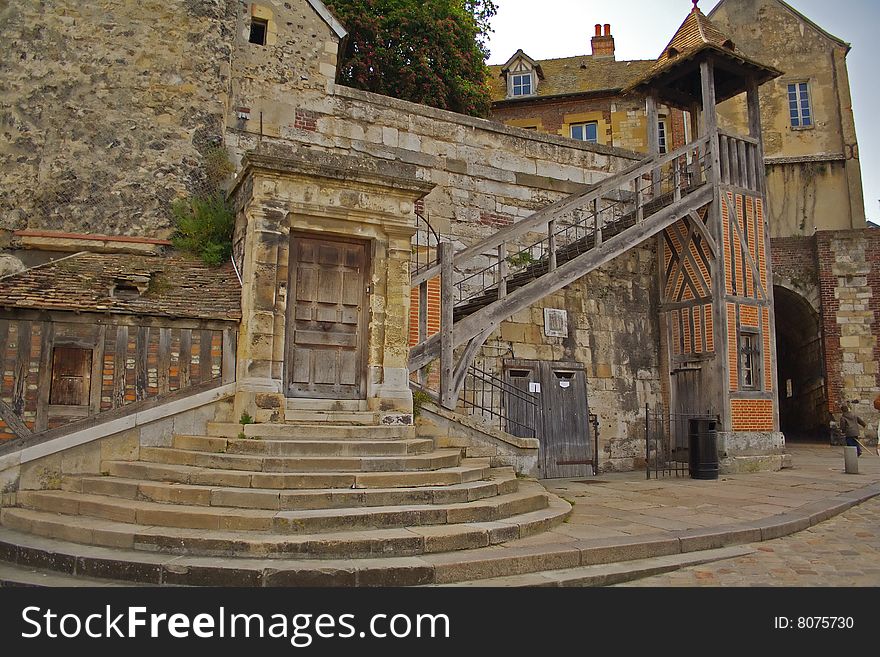 Building with circular stair in Honfleur's old city in Normandy, France. Building with circular stair in Honfleur's old city in Normandy, France