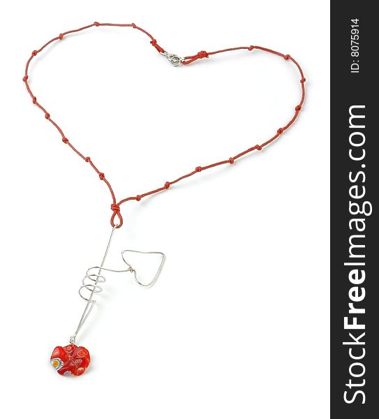 Heart shaped Jewelery. Colored Necklace with Heart shaped Silver part. White background.