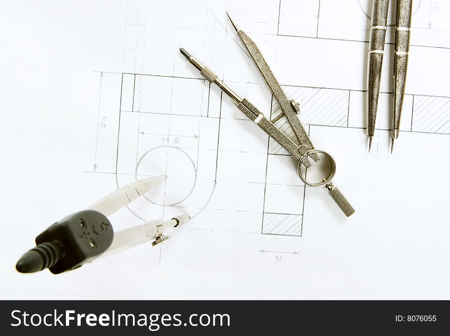 Drawing Compasses on paper close up