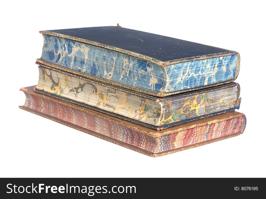 A pile of old leather bound books isolated on a white background