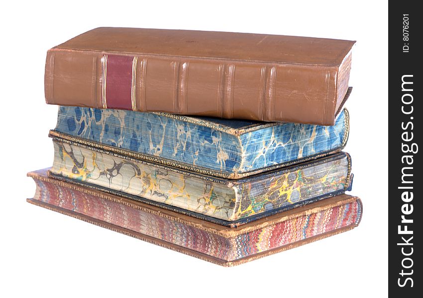 A pile of old leather bound books isolated on a white background