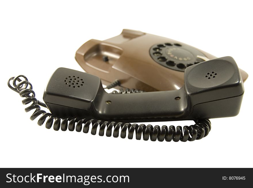 Old telephone on white background. Old telephone on white background