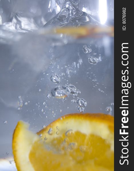 Slices of orange in water. Slices of orange in water