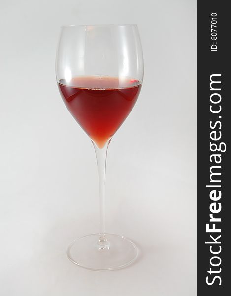 One glass with red wine