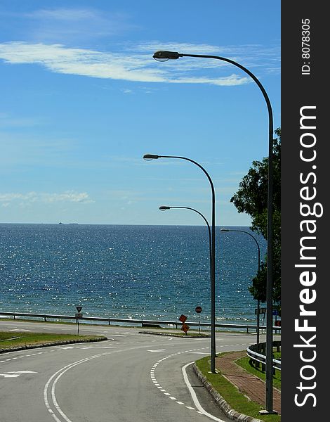 A road from University Malaysia Sabah toward the ocean. A road from University Malaysia Sabah toward the ocean.