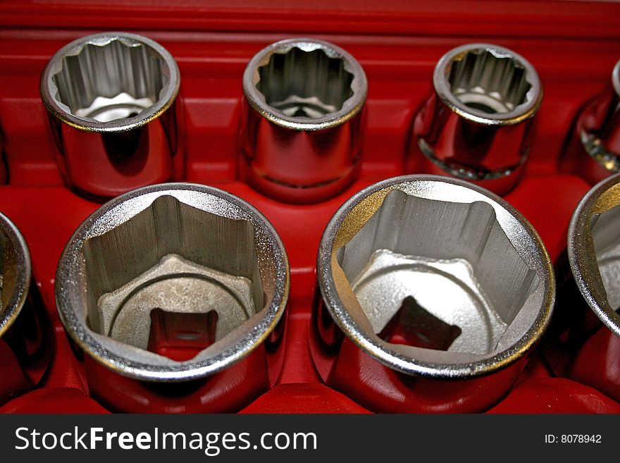 Sockets of varying sizes in red case. Sockets of varying sizes in red case