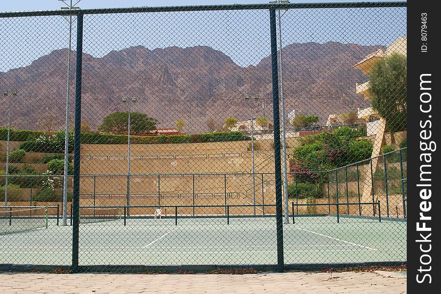 Tennis courts on territory of hotel. Fragment