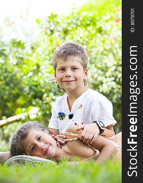 Portrait of little kids having good time in summer environment. Portrait of little kids having good time in summer environment