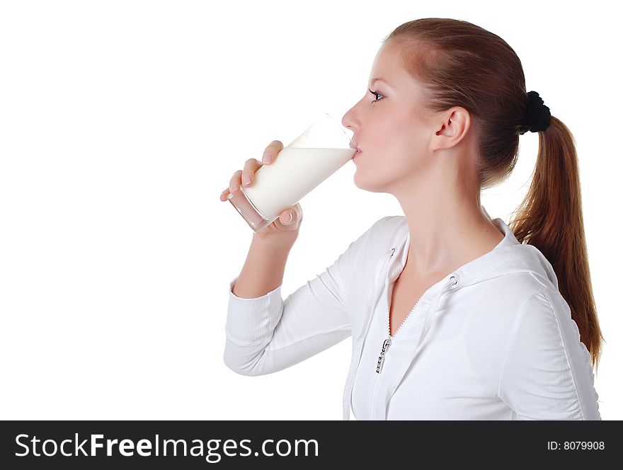 Young woman with glass of milk on white bacground