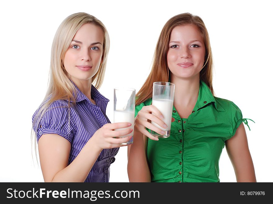 Two beautiful friends with two glass of milk. Two beautiful friends with two glass of milk